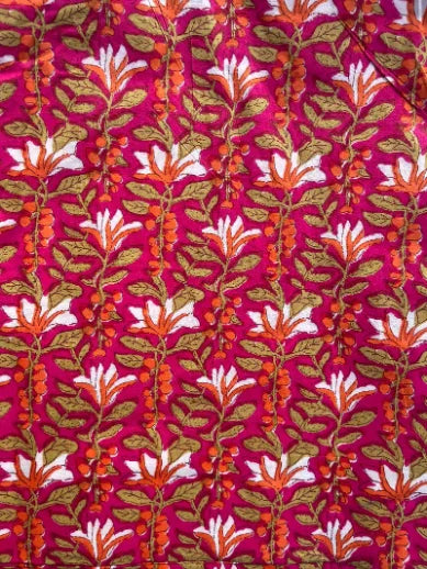 CF1Avani, Floral patterned fabric with red, orange, and green colours on a pink background, Sapling Textiles, Fabric Store Australia, Fabric online Australia, Indian Fabric