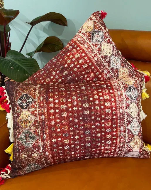 Decorative pillow with intricate patterns on a brown couch, Sapling Textiles, Fabric Store Australia, Indian Fabric online Australia