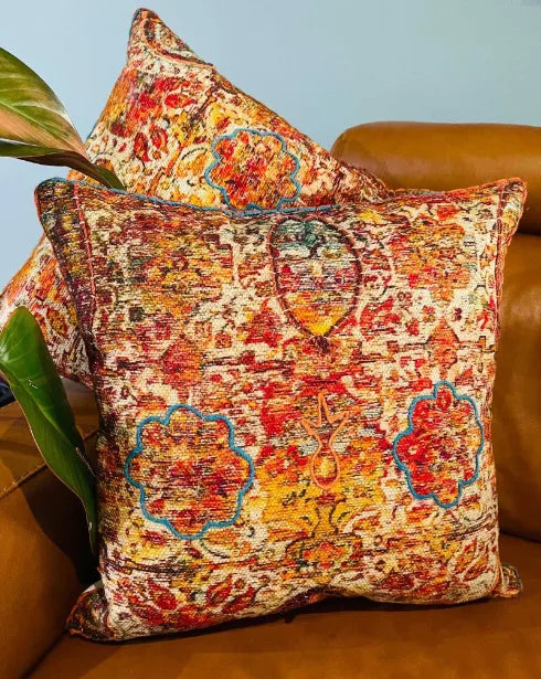 Decorative pillows with a floral pattern on a brown couch, Sapling Textiles, Fabric Store Australia, Indian Fabric online Australia