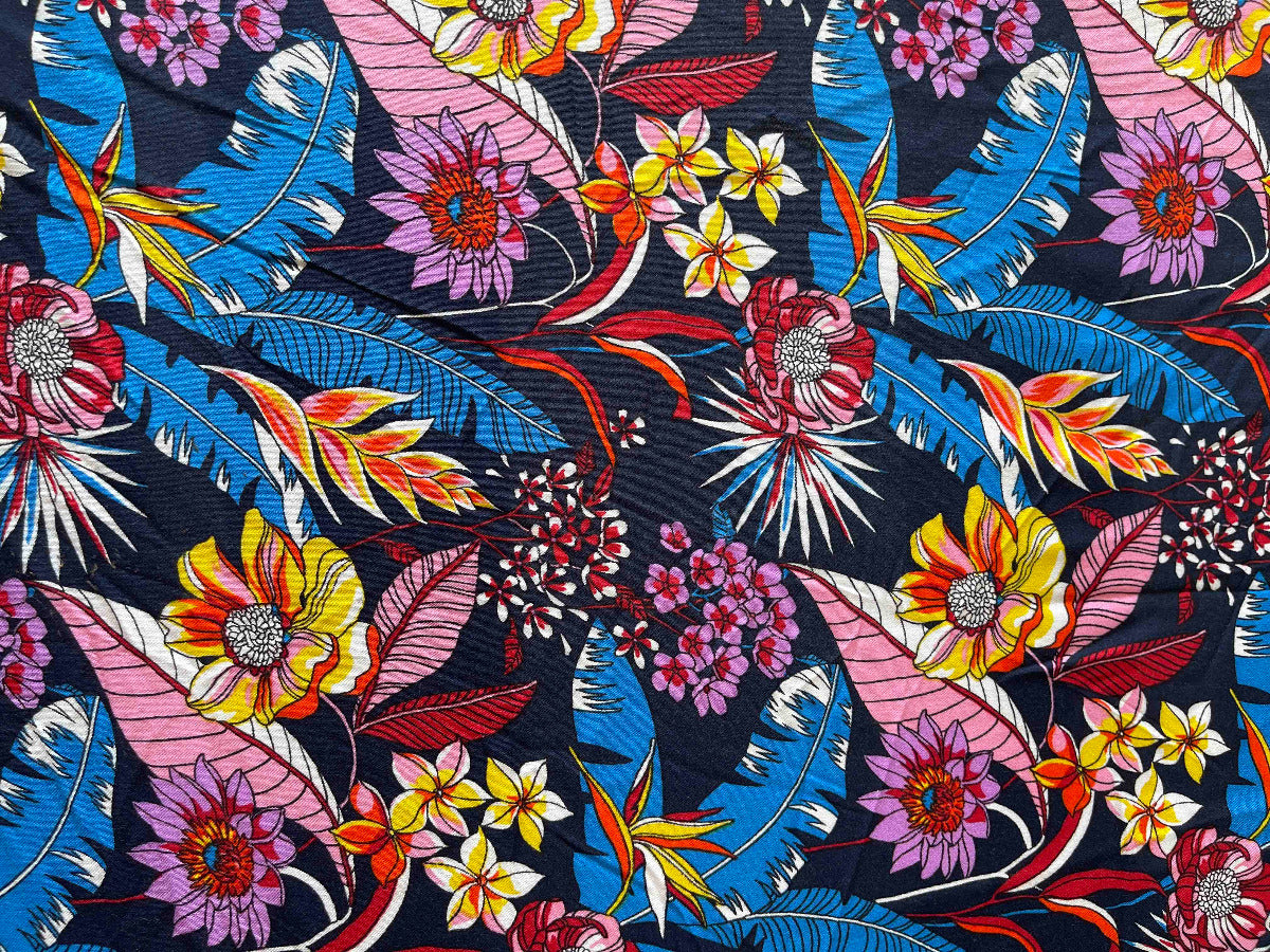 Colorful floral and leaf pattern on a dark background