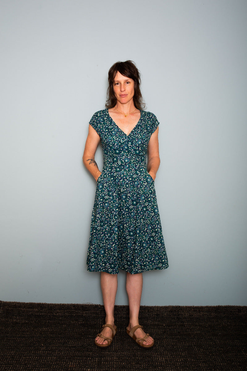 Woman wearing a dress standing against a plain background, Sapling Textiles, Fabric Store Australia, Indian Fabric online Australia 