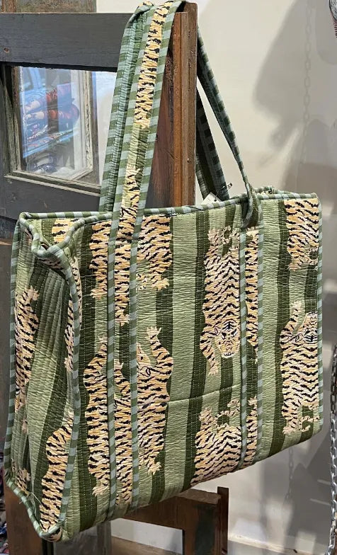 Green and brown patterned tote bag on a stand, Indian fabric, block print fabric, Indian block print fabric, Indian woodblock print fabric, Indian cotton fabric